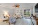 Cozy living room with stylish furnishings, ceiling fan and natural light, creating a comfortable atmosphere at 141 Ranch Haven Dr., Murrells Inlet, SC 29576