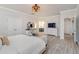 Spacious main bedroom with a decorative light fixture and an ensuite bathroom at 141 Ranch Haven Dr., Murrells Inlet, SC 29576