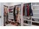 Organized walk-in closet with shelving for clothing, shoes, and accessories at 141 Ranch Haven Dr., Murrells Inlet, SC 29576