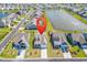 Aerial view of the property shows neighborhood amenities and lake views at 1463 Villena Dr., Myrtle Beach, SC 29579