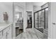 Beautifully designed bathroom featuring a tiled walk-in shower, and seamless entry into the main bedroom at 1463 Villena Dr., Myrtle Beach, SC 29579