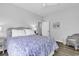 Comfortable bedroom with wood floors, a ceiling fan, and neutral paint at 1463 Villena Dr., Myrtle Beach, SC 29579