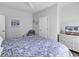 Well-lit bedroom with luxury vinyl plank flooring and neutral colored walls at 1463 Villena Dr., Myrtle Beach, SC 29579