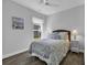 Cozy bedroom with a beach-inspired theme, wood flooring, and an exterior view at 1463 Villena Dr., Myrtle Beach, SC 29579