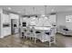 Bright kitchen featuring white cabinets, stainless steel appliances, and large island at 1463 Villena Dr., Myrtle Beach, SC 29579