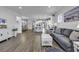 Open-concept living space with hardwood floors, and modern furnishings at 1463 Villena Dr., Myrtle Beach, SC 29579