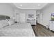 Spacious main bedroom showcasing tray ceilings, recessed lighting and private entryways at 1463 Villena Dr., Myrtle Beach, SC 29579
