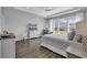 Bright main bedroom with hardwood floors, recessed lights, and a view of the outdoors at 1463 Villena Dr., Myrtle Beach, SC 29579