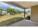 Covered back porch with a view of the front yard and neighborhood at 1800 Wood Stork Dr., Conway, SC 29526