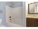 Bright bathroom featuring a bathtub/shower combination and a vanity with a mirror at 1800 Wood Stork Dr., Conway, SC 29526