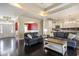 Open concept living room featuring hardwood floors, neutral walls and access to kitchen at 1800 Wood Stork Dr., Conway, SC 29526