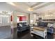 Spacious living room showcasing hardwood floors, neutral colors, and an open layout to the kitchen at 1800 Wood Stork Dr., Conway, SC 29526