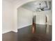 Large living room featuring an archway, hardwood floors, and access to other rooms at 1800 Wood Stork Dr., Conway, SC 29526