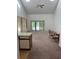 Bright living area with high ceilings and sliding glass doors for natural light and space at 1870 Auburn Ln. # 21 E, Surfside Beach, SC 29575