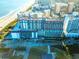 Panoramic aerial view of a beachfront resort complex, highlighting its multiple pools, ocean views, and amenities at 201 77Th Ave. N # 828, Myrtle Beach, SC 29572