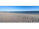 View of a tranquil beach with a wide sandy expanse and the blue ocean at 201 77Th Ave. N # 828, Myrtle Beach, SC 29572