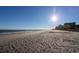 Scenic view of a sandy beach with the ocean and buildings in the distance at 201 77Th Ave. N # 828, Myrtle Beach, SC 29572