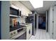 Compact kitchen complete with stainless steel appliances and plenty of cabinet space at 201 77Th Ave. N # 828, Myrtle Beach, SC 29572