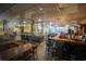 Interior of a restaurant featuring a dining area and bar with seating at 201 77Th Ave. N # 828, Myrtle Beach, SC 29572