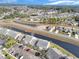 Aerial view of waterfront townhomes in a meticulously maintained community with ample parking and neighborhood amenities at 205 Double Eagle Dr. # C-2, Myrtle Beach, SC 29575