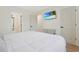 Bedroom featuring a comfortable bed, TV, en-suite bathroom and closet doors at 205 Double Eagle Dr. # C-2, Myrtle Beach, SC 29575