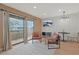 Living room with a balcony, TV, modern furniture and an open layout at 205 Double Eagle Dr. # C-2, Myrtle Beach, SC 29575