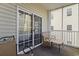 Relaxing balcony features seating and views of the community at 2090 Cross Gate Blvd. # 205, Surfside Beach, SC 29575