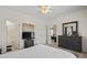 Neutral bedroom with a dresser, television and view to another bedroom and bathroom at 2090 Cross Gate Blvd. # 205, Surfside Beach, SC 29575