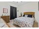Bedroom featuring a wicker headboard, natural light and neutral walls and carpet at 2090 Cross Gate Blvd. # 205, Surfside Beach, SC 29575
