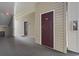 Exterior hallway featuring unit 205 and other unit front doors at 2090 Cross Gate Blvd. # 205, Surfside Beach, SC 29575