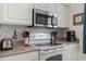 Well-equipped kitchen with modern appliances and ample counter space, perfect for preparing delicious meals at 2090 Cross Gate Blvd. # 205, Surfside Beach, SC 29575