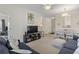 Inviting living room with dining area, neutral tones, and comfortable furnishings at 2090 Cross Gate Blvd. # 205, Surfside Beach, SC 29575