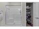 Bathroom featuring a walk-in shower with glass door and linen storage at 232 Je Edward Dr. # 21, Myrtle Beach, SC 29588