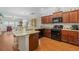 Well-equipped kitchen with breakfast bar seamlessly connecting to the adjacent living room at 232 Je Edward Dr. # 21, Myrtle Beach, SC 29588