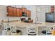 Charming kitchen featuring granite countertops, breakfast bar with seating, and stainless steel appliances at 232 Je Edward Dr. # 21, Myrtle Beach, SC 29588