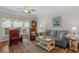 Classic living room featuring a cozy seating arrangement, grandfather clock, and tasteful decor at 232 Je Edward Dr. # 21, Myrtle Beach, SC 29588