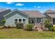 Charming backyard with a covered patio, outdoor grill, and well-maintained lawn at 2464 Rock Dove Rd., Myrtle Beach, SC 29577