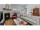 Inviting living room with fireplace, comfortable seating, and plenty of natural light at 2464 Rock Dove Rd., Myrtle Beach, SC 29577