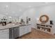 Open-concept living and kitchen area with vaulted ceilings and wood flooring at 2464 Rock Dove Rd., Myrtle Beach, SC 29577