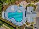 Aerial view of the community pool, complete with lounge chairs and a clubhouse at 2464 Rock Dove Rd., Myrtle Beach, SC 29577