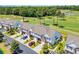 Aerial view of the townhomes showcasing well-manicured landscaping and proximity to golf course at 260 Connemara Dr. # E, Myrtle Beach, SC 29579