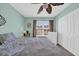 Bedroom features a ceiling fan, window, and a built in dresser at 260 Connemara Dr. # E, Myrtle Beach, SC 29579