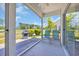 Covered patio overlooking golf course, featuring an outdoor grill and seating, perfect for entertaining at 260 Connemara Dr. # E, Myrtle Beach, SC 29579