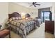 This bedroom offers two queen beds, a ceiling fan, and balcony access with ocean views at 2600 N Ocean Blvd. # 1103, Myrtle Beach, SC 29577