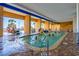Resort-style indoor pool area with lounge seating and ocean views at 2600 N Ocean Blvd. # 1103, Myrtle Beach, SC 29577