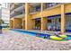 Outdoor pool and lazy river with lounge chairs and eating areas at 2600 N Ocean Blvd. # 1103, Myrtle Beach, SC 29577