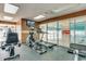 Clean gym featuring modern cardio machines and workout equipment with a TV at 2701 S Ocean Blvd. # 1603, North Myrtle Beach, SC 29582