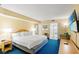 Comfortable main bedroom featuring a king-sized bed, a dresser with TV, and ensuite bathroom access at 2701 S Ocean Blvd. # 1603, North Myrtle Beach, SC 29582