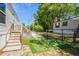 Spacious backyard with a patio, green space, and fenced perimeter at 2706 Willow St., North Myrtle Beach, SC 29582