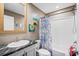 Clean bathroom with a shower-tub combo, modern vanity, and colorful decor at 2706 Willow St., North Myrtle Beach, SC 29582